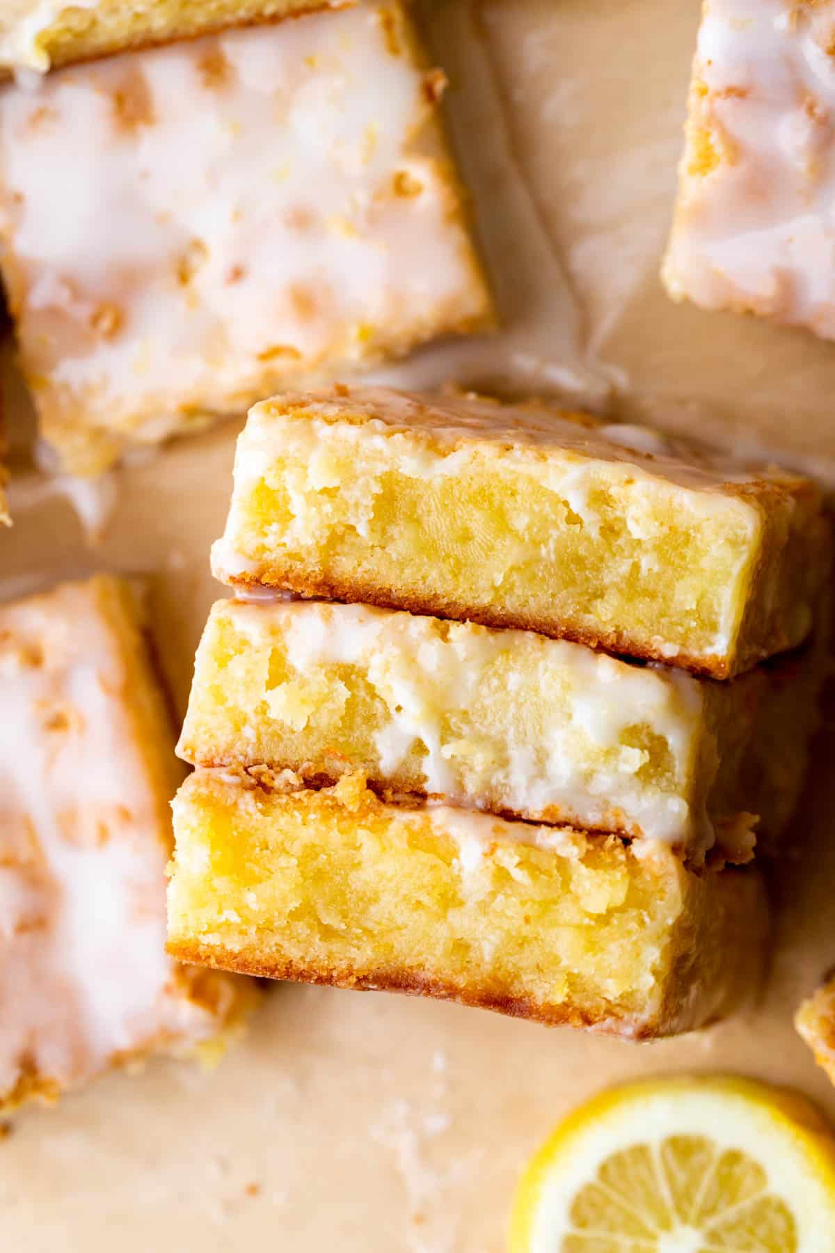 Three lemon brownies on its side.