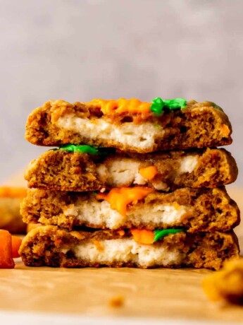 Stack of two carrot cake cookies split in half.