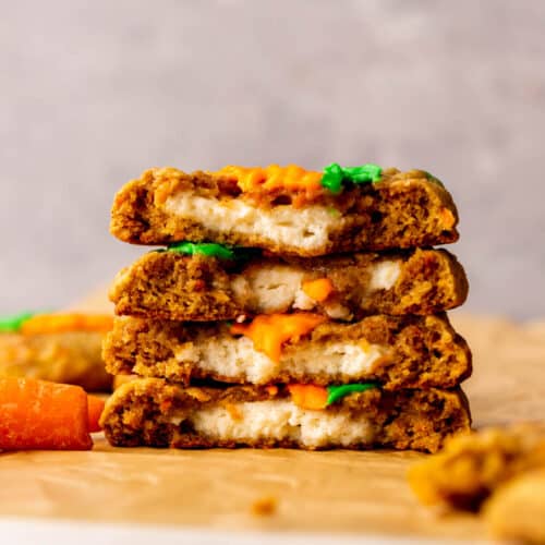 Stack of two carrot cake cookies split in half.
