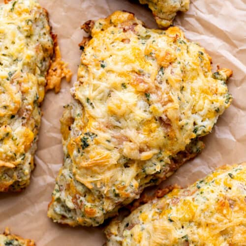 Cheese scones on parchment paper.