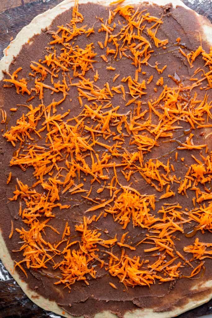 Carrot on top of the dough.