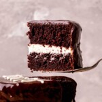 Taking a slice out of the ding dong cake.