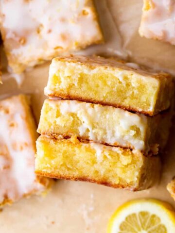 Three lemon brownies on its side.