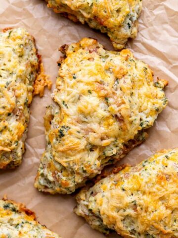 Cheese scones on parchment paper.
