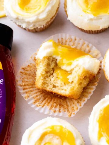 Bite missing from lemon bar cupcakes.