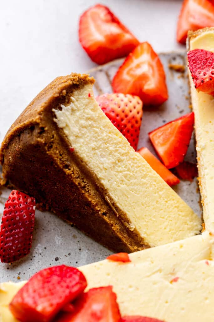 One slice of cheesecake on its side.