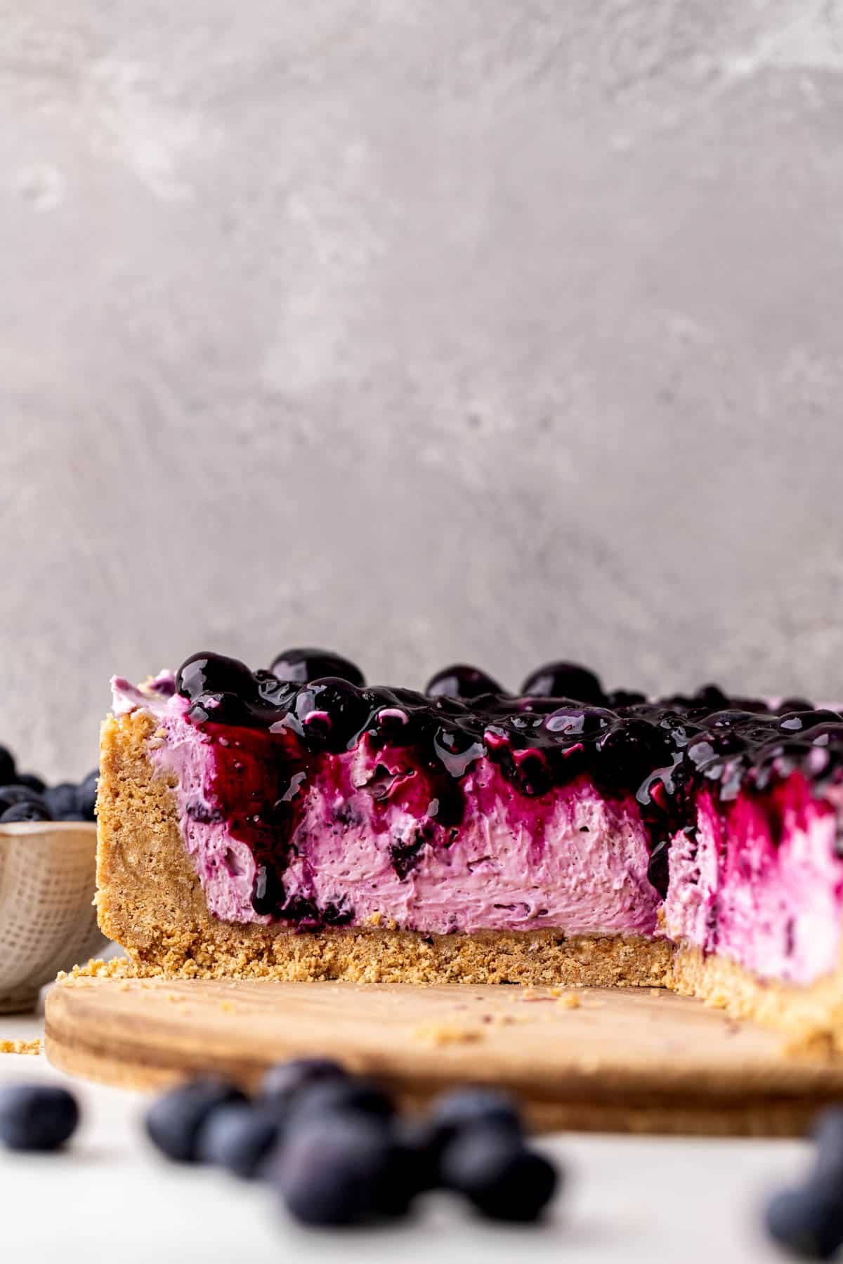 Side view of a no bake blueberry cheesecake.
