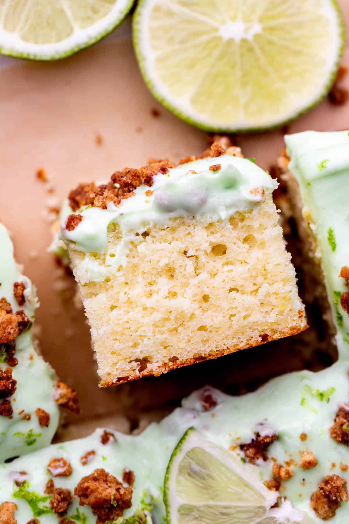 Piece of key lime pie cake on its side.