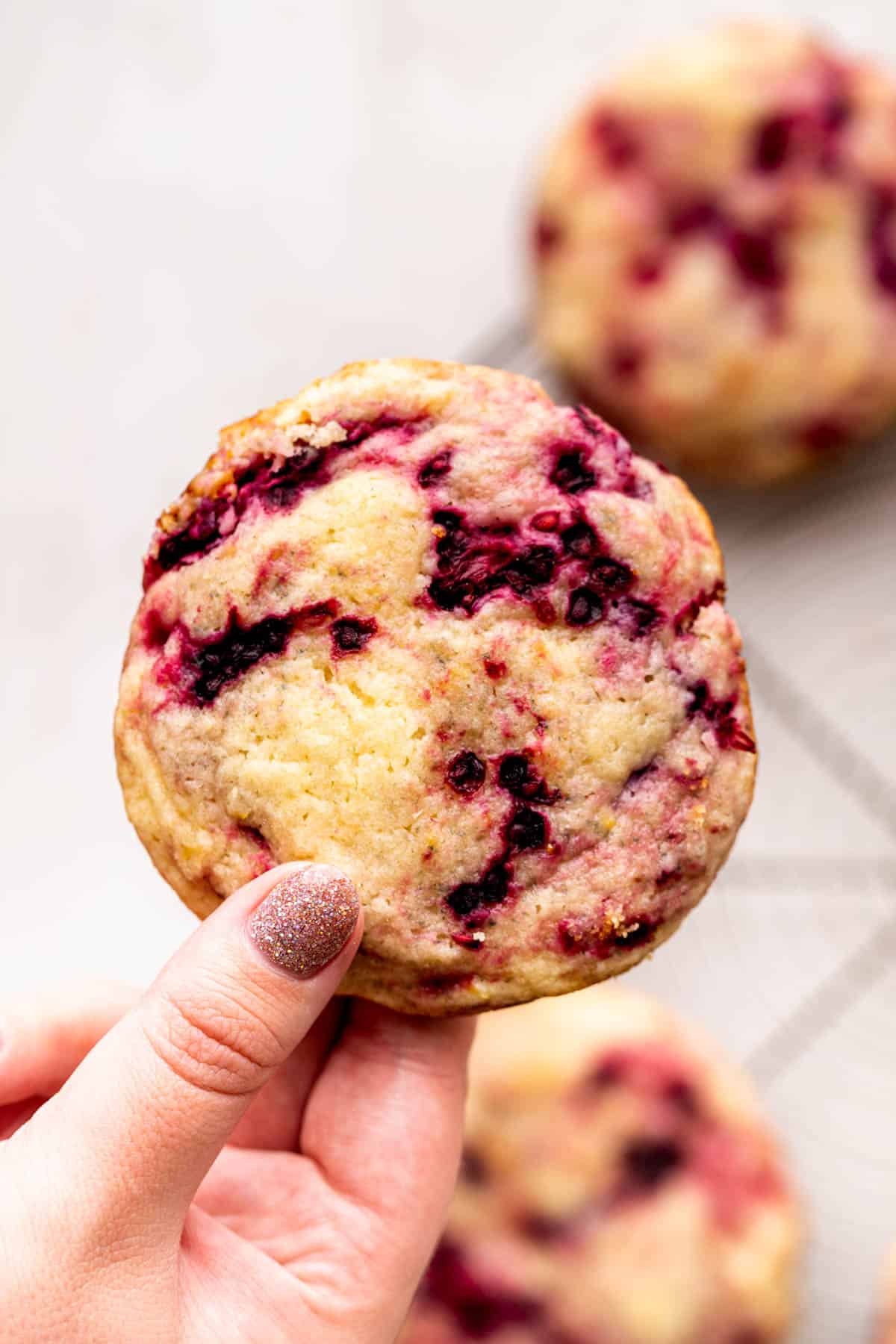 Holding a lemon blackberry cookie in my hand.