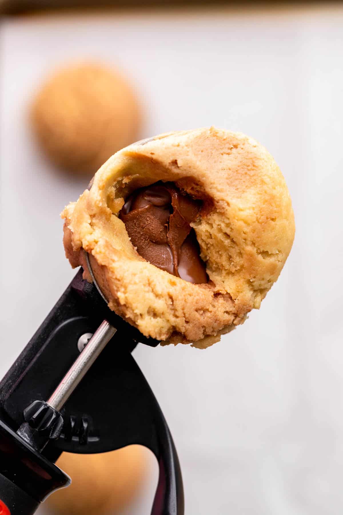 Nutella inside a cookie dough ball.
