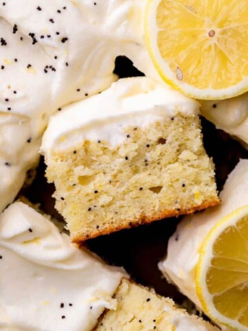 One slice of lemon poppy seed cake on its side.