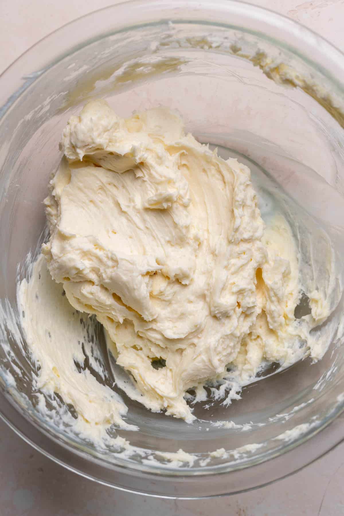 Cream cheese filling in a glass bowl.