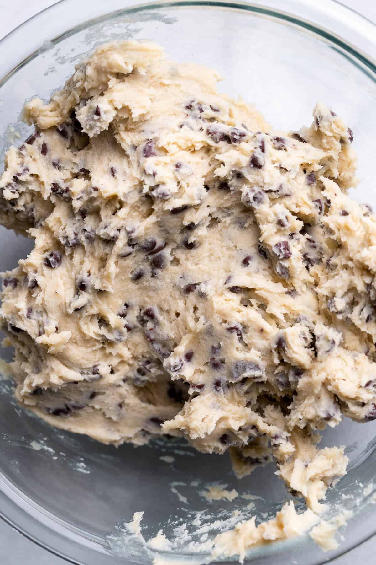 Edible cookie dough in a glass bowl.