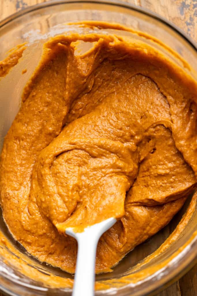Pumpkin batter in a glass bowl.
