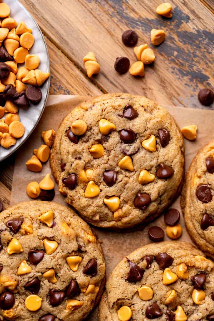 Butterscotch chocolate chip cookies on parchment paper.