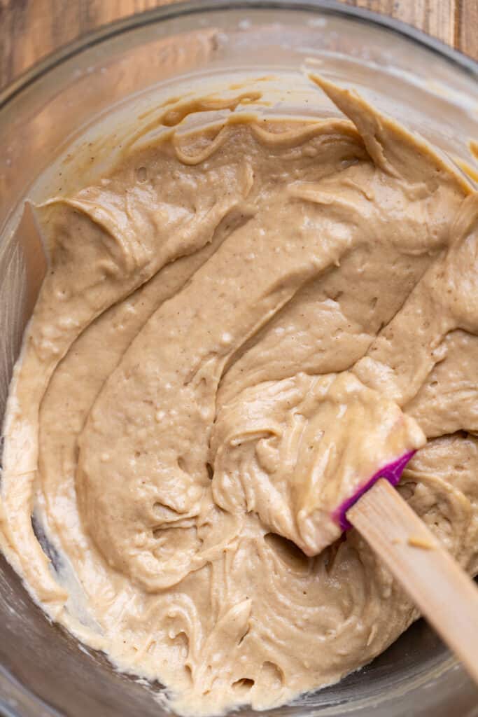 Maple cake batter in a glass bowl.