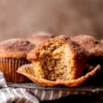 Bite missing from apple cider muffin.