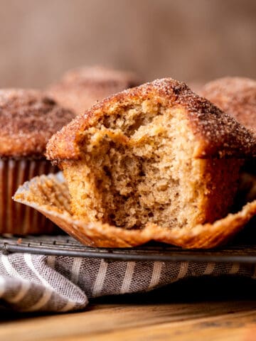 Bite missing from apple cider muffin.
