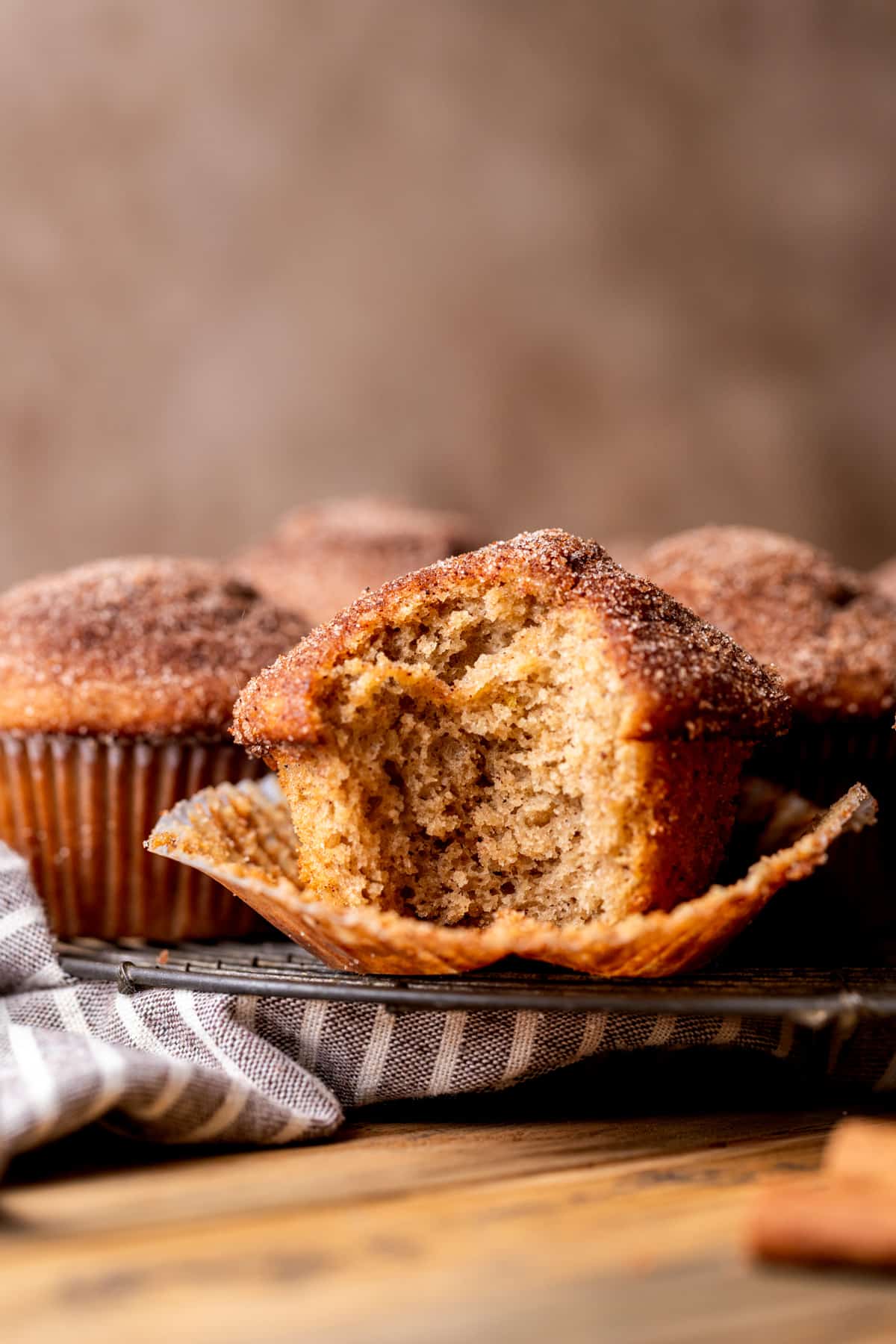 Bite missing from apple cider muffin.