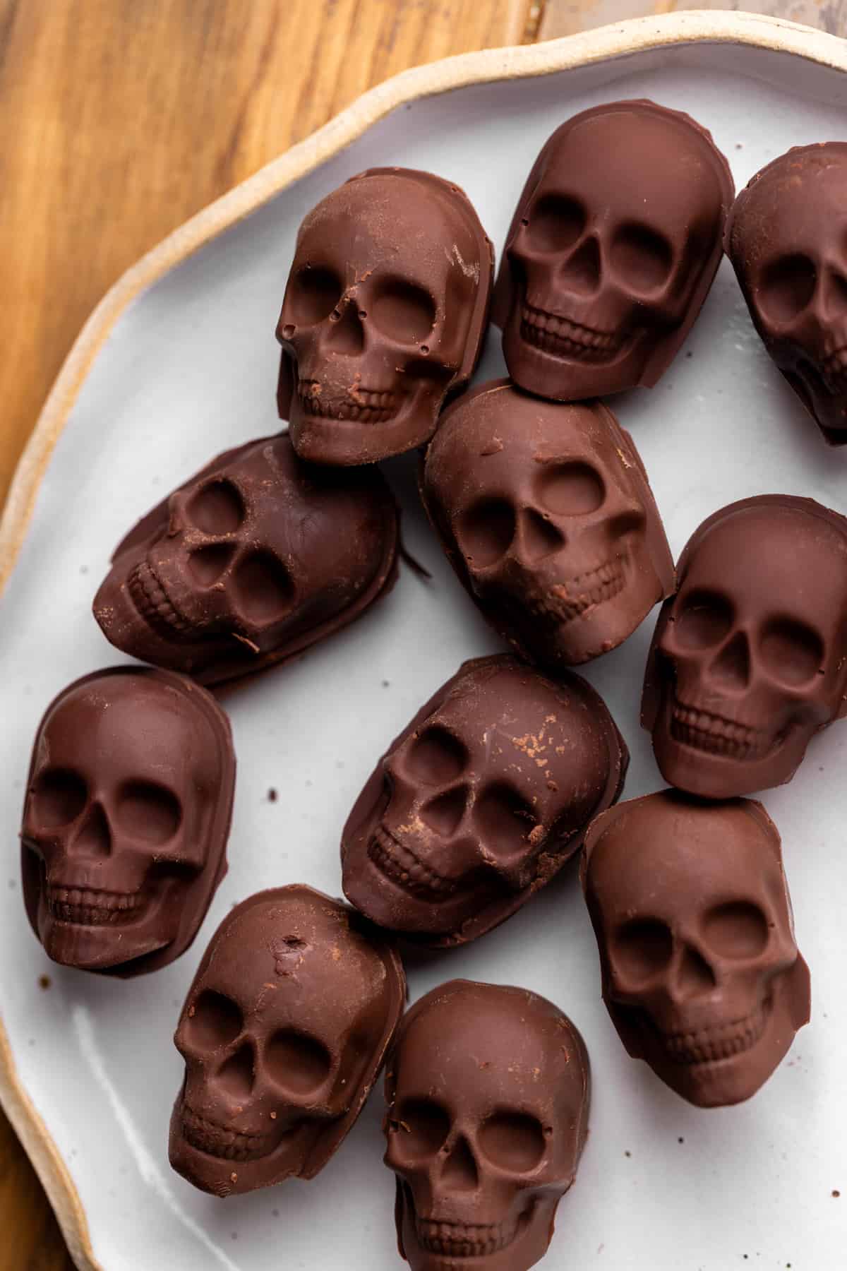 Chocolate skulls on a plate.