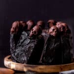 Halloween chocolate cake on a cake stand.
