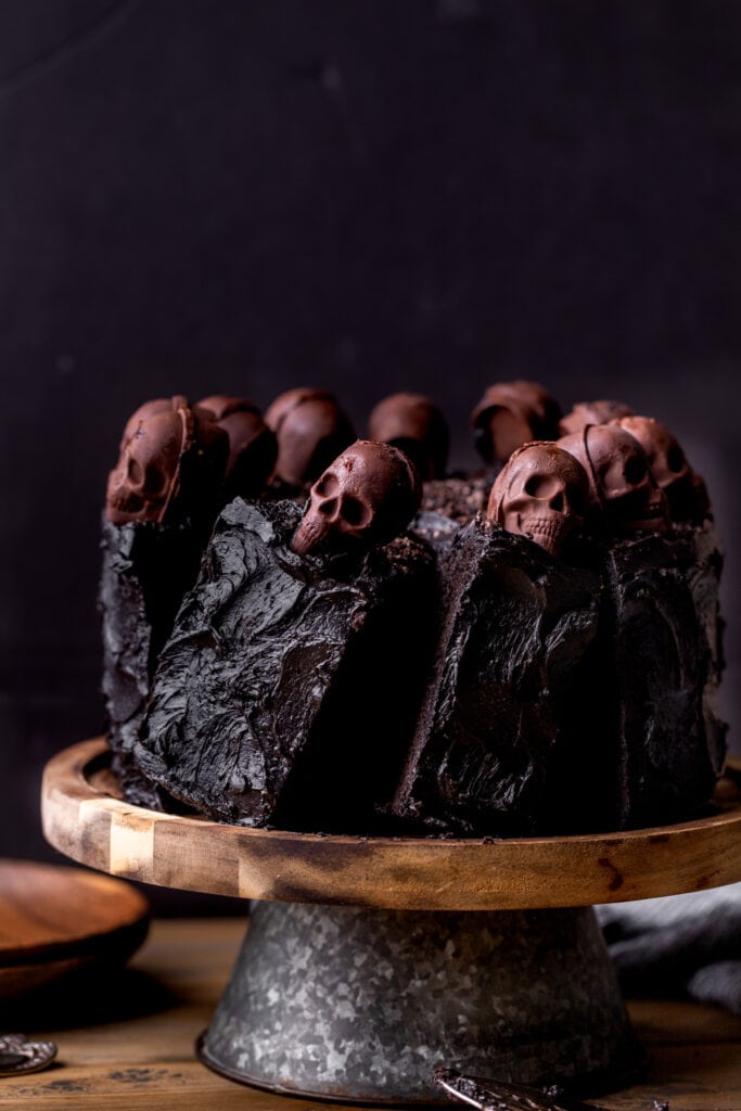 Halloween chocolate cake on a cake stand.