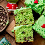 Two slices of grinch cake on it's side.