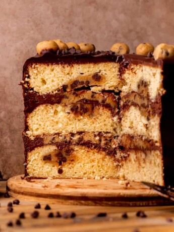 Split open cookie dough cake on a platter.