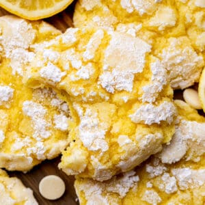 Top view of a bite missing from lemon crinkle cookies.