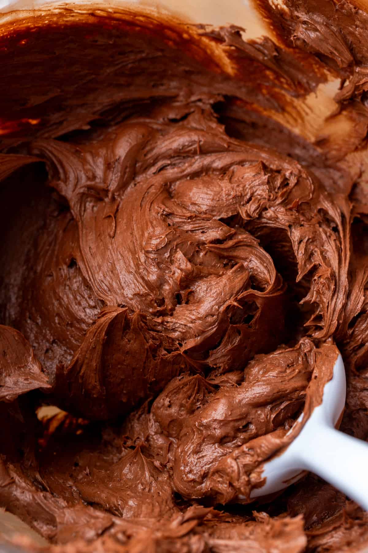 Nutella frosting in a glass bowl.
