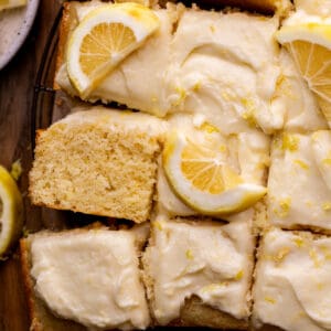 Lemon drizzle cake on a platter.