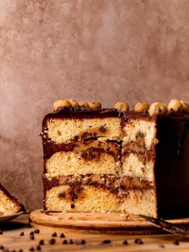 Split open cookie dough cake on a platter.
