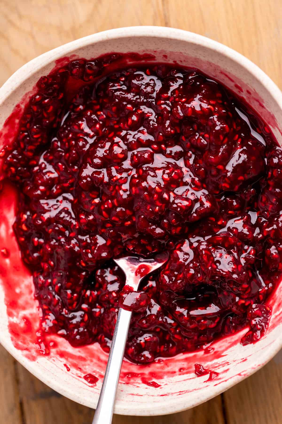 Raspberry jam in a bowl.