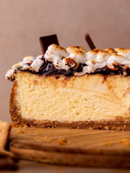 S'mores cheesecake open on a platter.