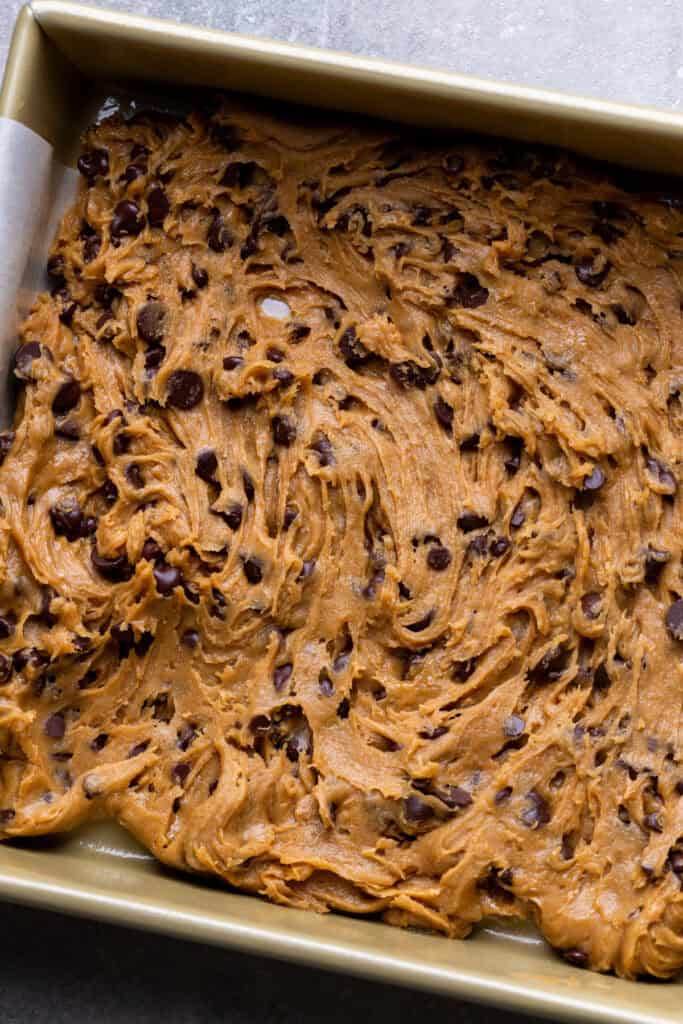 Part of the cookie dough in the pan.