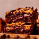 Close up of stack of caramel cookie bars.