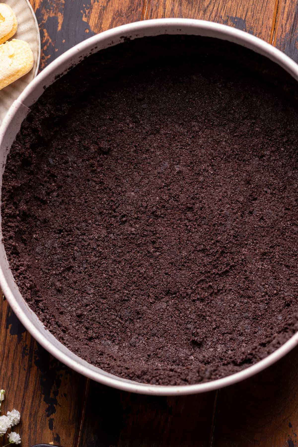 Oreo crust in the pan.