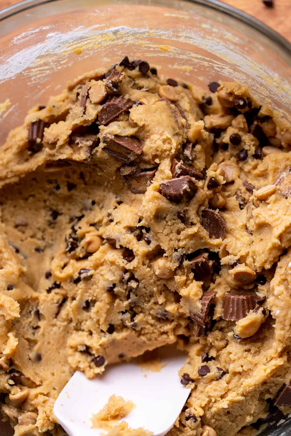 Peanut butter cookie dough in a glass ball.