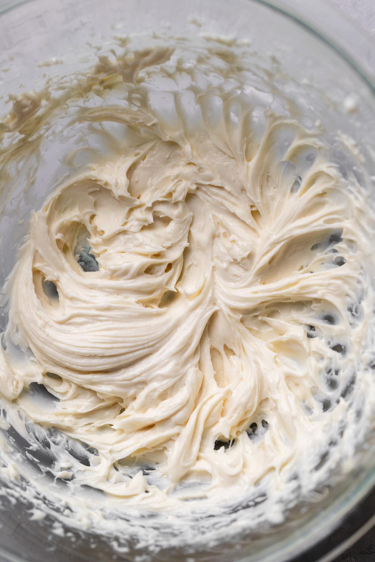 Cream cheese filling in a glass bowl.