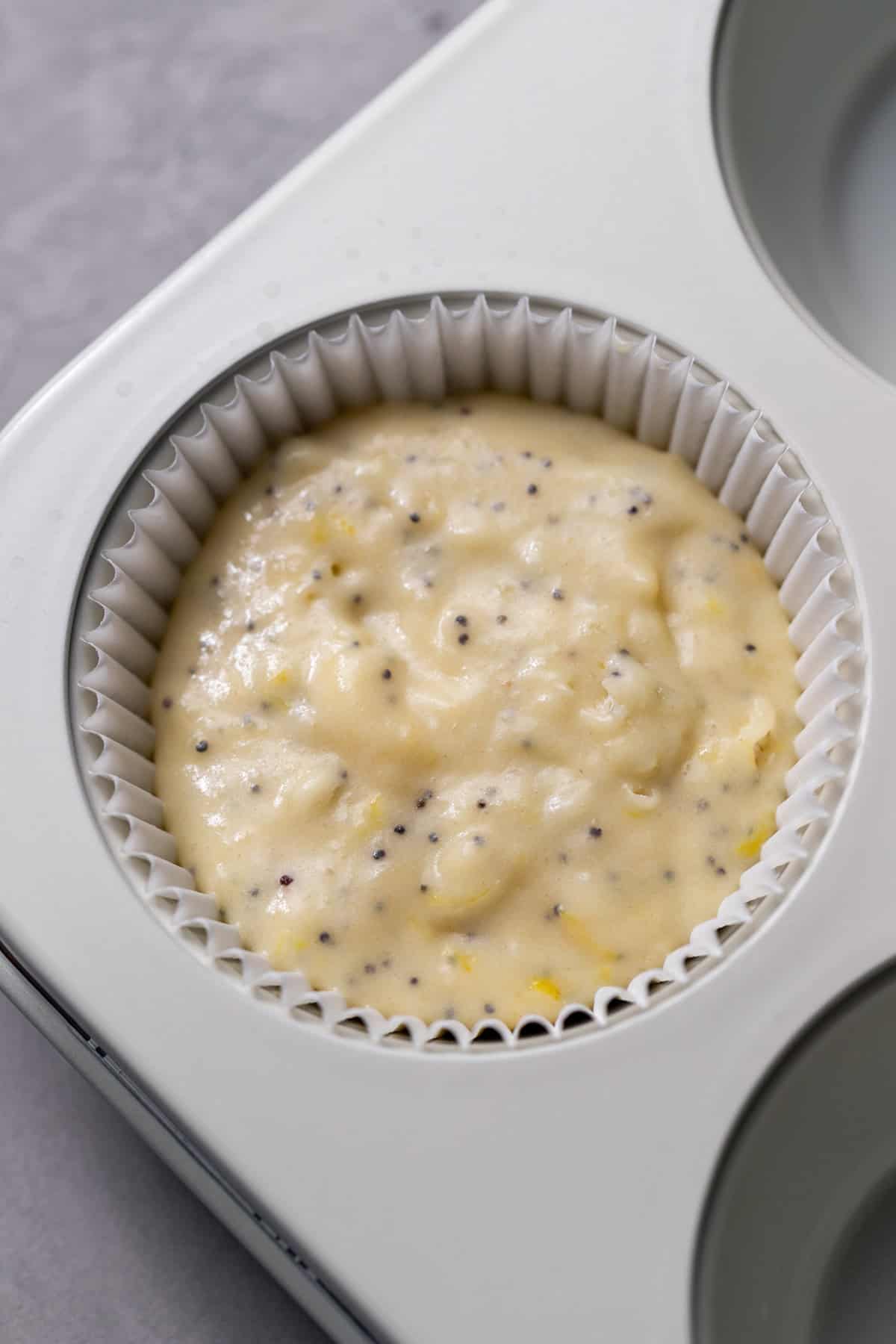 Muffin batter in pan.