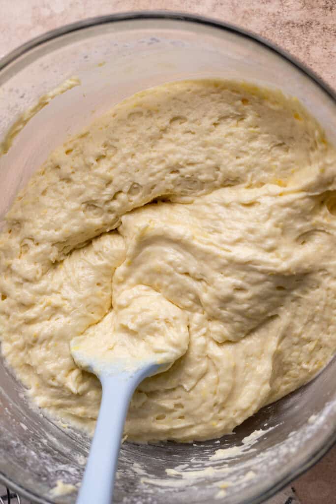 Lemon cake batter in a glass bowl.