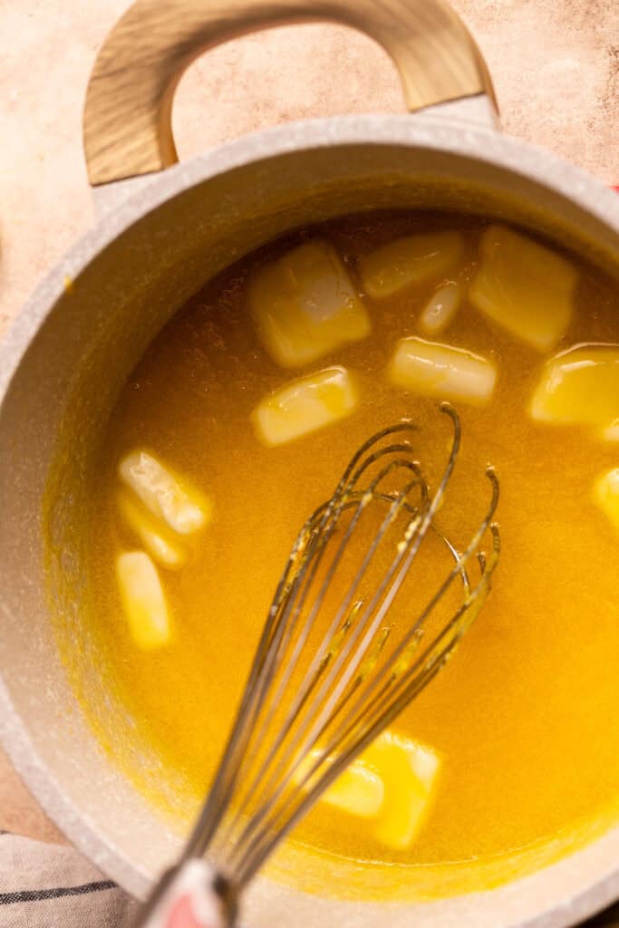 Butter added to the pot.