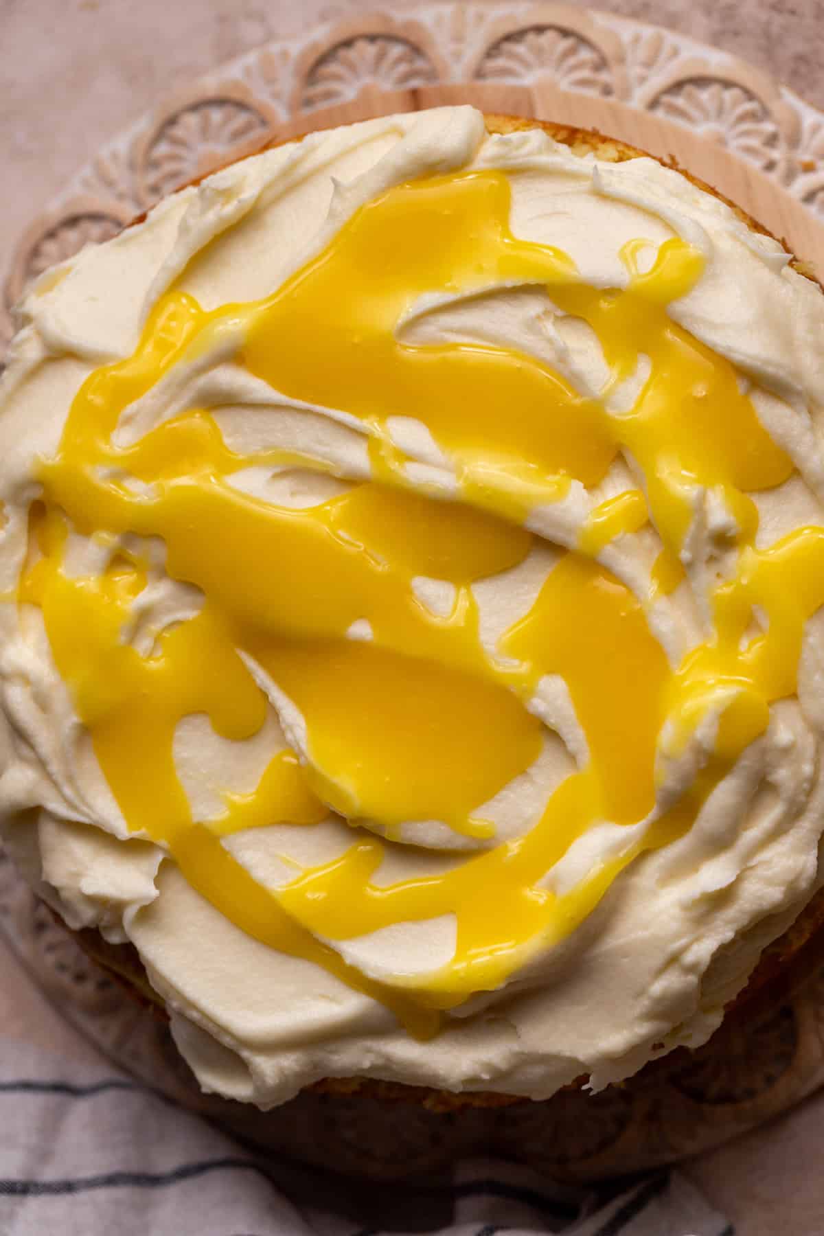 Lemon curd on top of the cake.