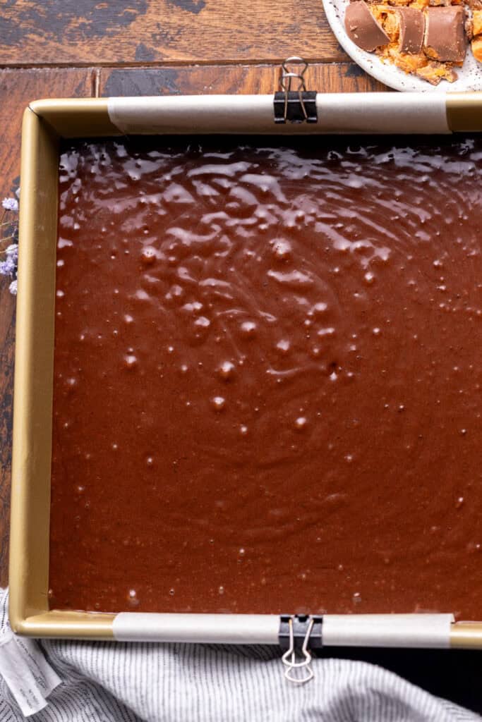 Cake batter in the pan.