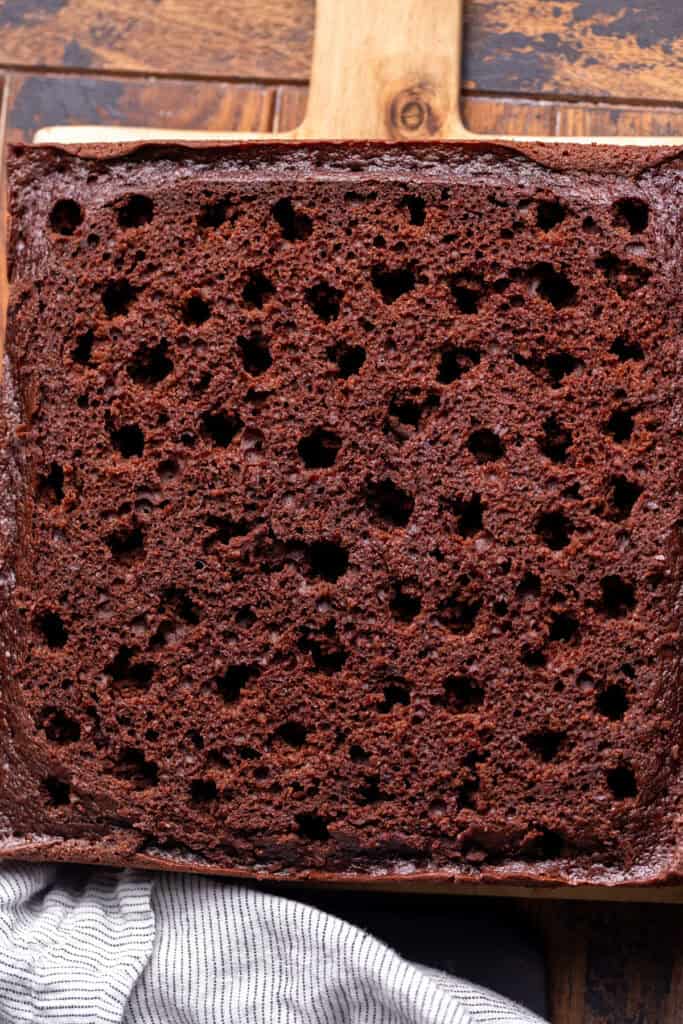 Cake poked with holes.