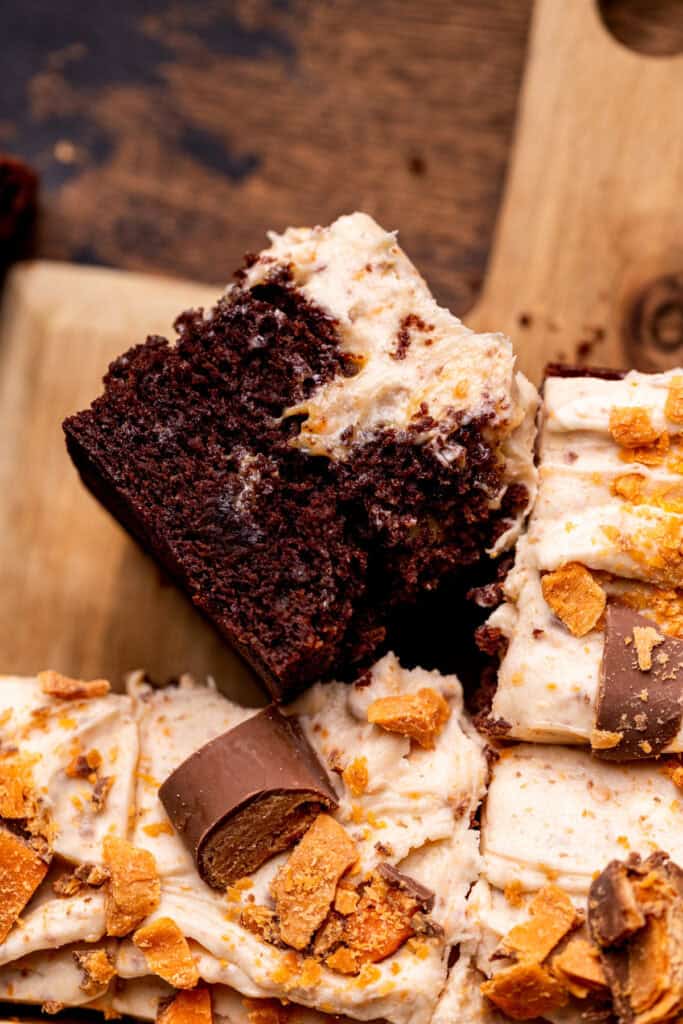 One piece of butterfinger cake on its side.