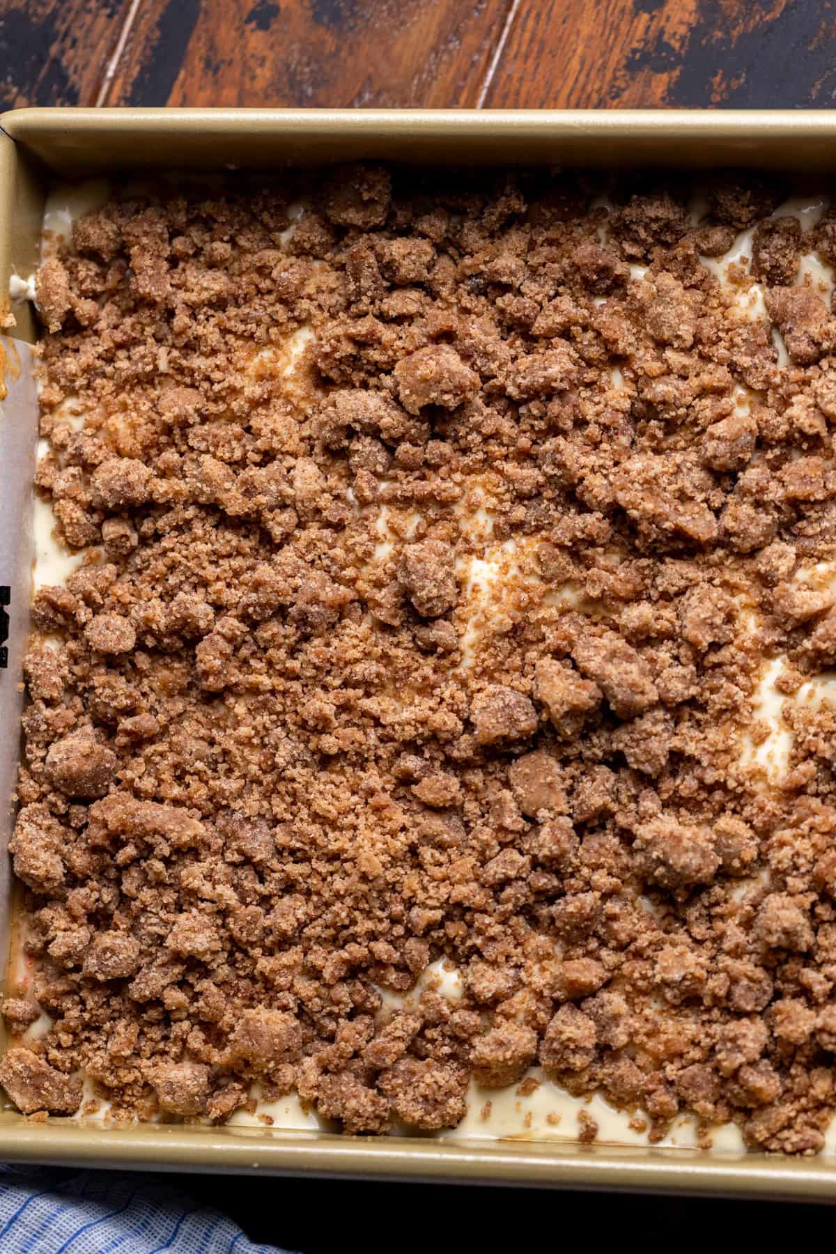 Cinnamon crumble on top of batter.