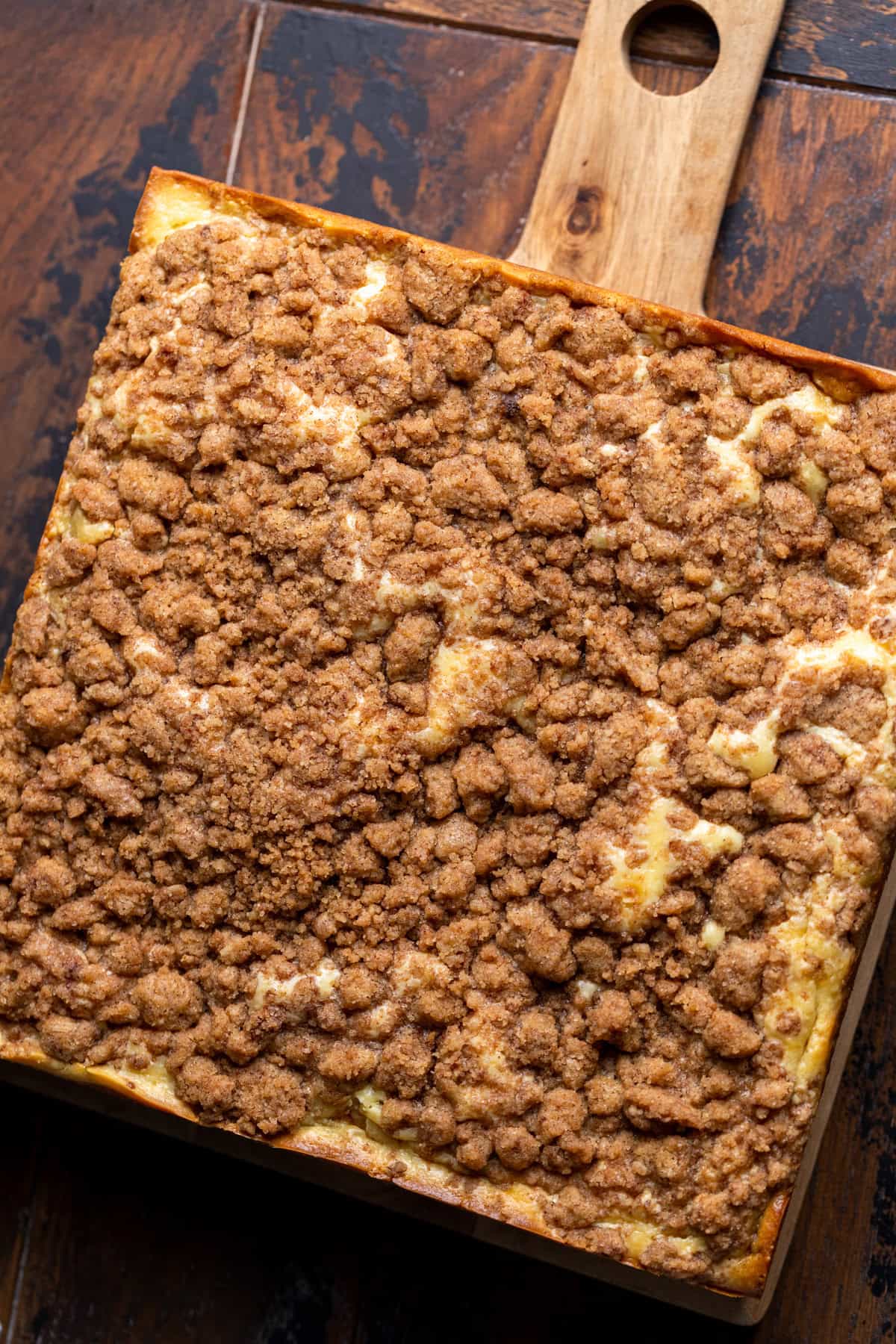 Baked cake on a board.