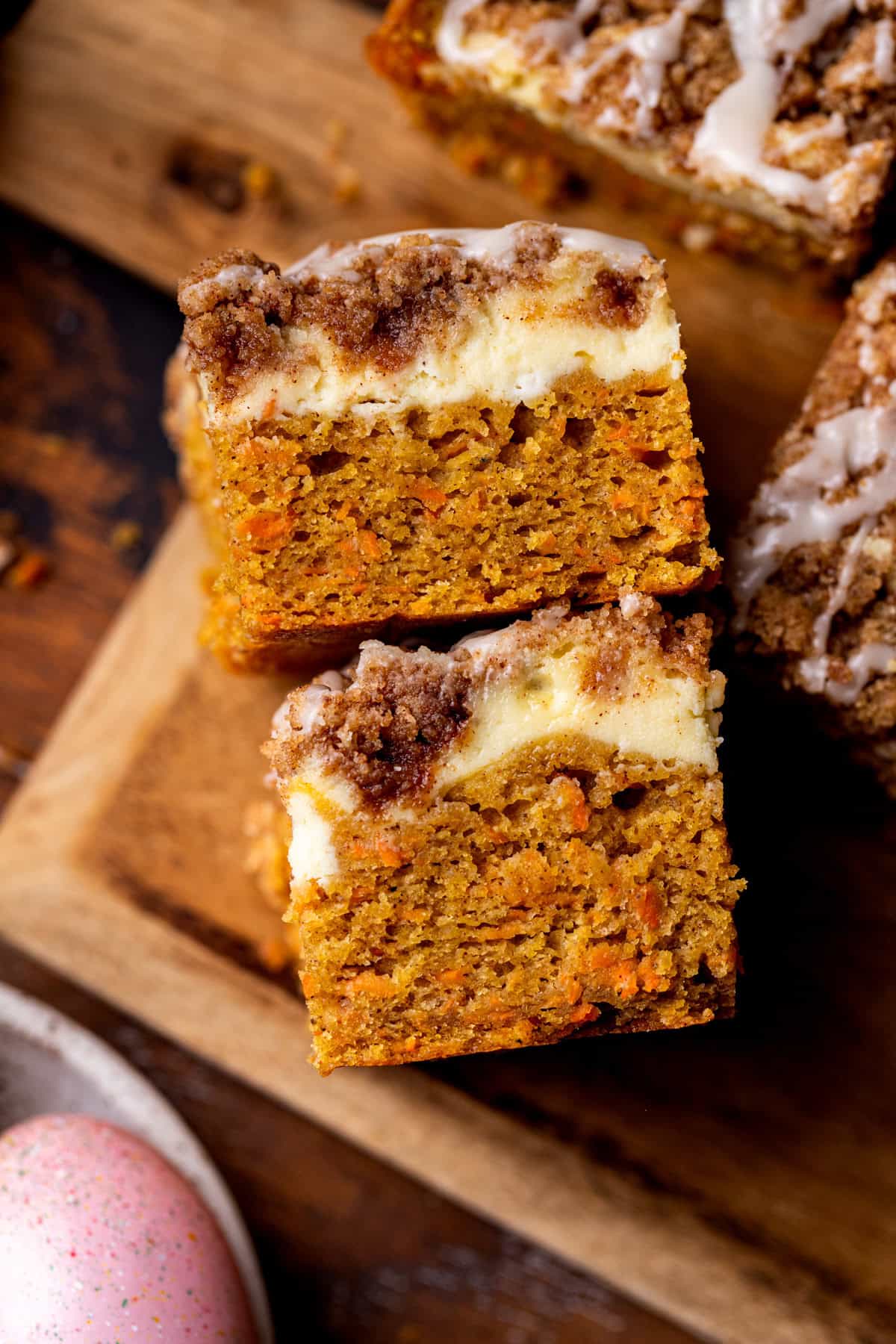 Two slices of carrot cake coffee cake on its side.