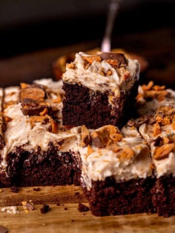 Stack of two butterfinger cake slices.